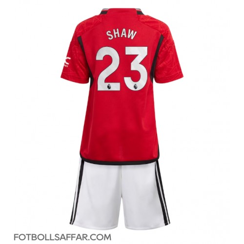Manchester United Luke Shaw #23 Hemmadräkt Barn 2023-24 Kortärmad (+ Korta byxor)